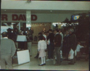 Crowd watching a painter